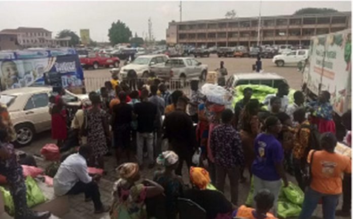 Kumasi residents in queue to buy from Planting for Food and Jobs Market Kumasi residents in queue to buy from Planting for Food and Jobs Market