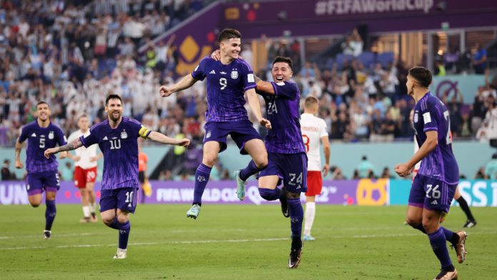 Julian Alvarez of Argentina celebrates with teammates after scoring their team’s second goal during the FIFA World Cup Qatar 2022 Group C match between Poland and Argentina at Stadium 974 on November 30, 2022 in Doha, Qatar. (Photo by Clive Brunskill) Image credit: Getty Images Julian Alvarez of Argentina celebrates with teammates after scoring their team’s second goal during the FIFA World Cup Qatar 2022 Group C match between Poland and Argentina at Stadium 974 on November 30, 2022 in Doha, Qatar. (Photo by Clive Brunskill) Image credit: Getty Images