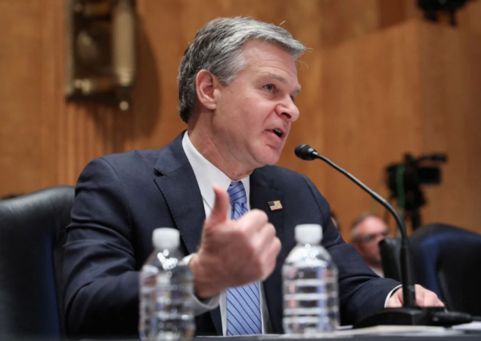 FBI Director Christopher Wray gives a statement during a U.S. Senate Homeland Security and Governmental Affairs Committee hearing on "Security threats to the United States", on Capitol Hill in Washington, U.S., November 17, 2022. REUTERS/Amanda Andrade-Rhoades FBI Director Christopher Wray gives a statement during a U.S. Senate Homeland Security and Governmental Affairs Committee hearing on "Security threats to the United States", on Capitol Hill in Washington, U.S., November 17, 2022. REUTERS/Amanda Andrade-Rhoades