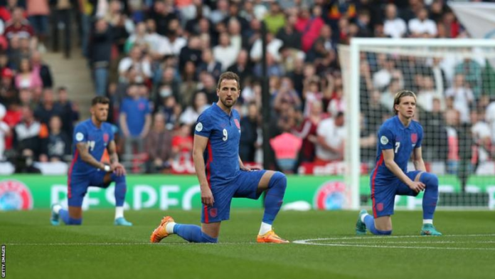 England players take the knee to highlight the fight against racism and inequality