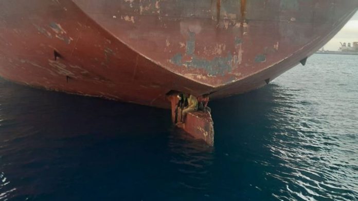 skynews-spain-migrant-stoaway_5981017 (Copy) The Spanish coastguard rescued three migrants stowed away on the rudder. Pic: Salvamento Maritimo