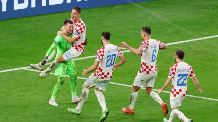 Dominik Livakovic and Mario Pasalic of Croatia celebrate after their side won the penalty shoot out during the FIFA World Cup Qatar 2022 Round of 16 match between Japan and Croatia at Al Janoub Stadium on December 05, 2022 in Al Wakrah, Qatar Image credit: Getty Images Dominik Livakovic and Mario Pasalic of Croatia celebrate after their side won the penalty shoot out during the FIFA World Cup Qatar 2022 Round of 16 match between Japan and Croatia at Al Janoub Stadium on December 05, 2022 in Al Wakrah, Qatar Image credit: Getty Images