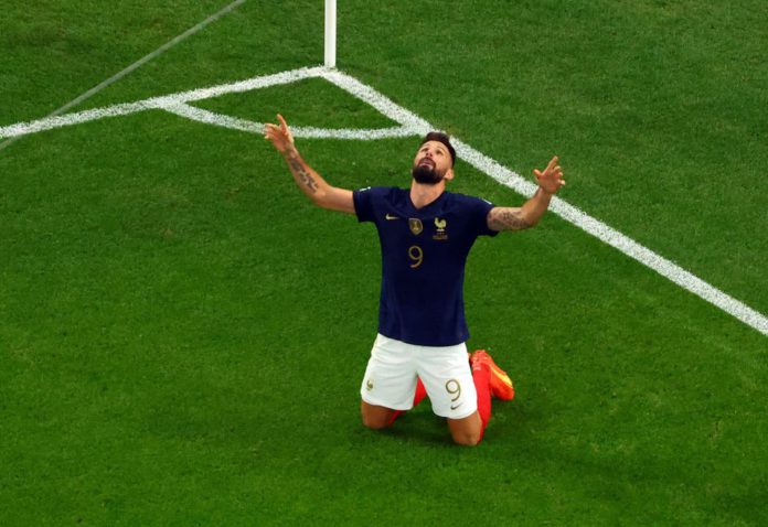 FIFA World Cup Qatar 2022 - Round of 16 - France v Poland - Al Thumama Stadium, Doha, Qatar - December 4, 2022 France's Olivier Giroud celebrates scoring their first goal REUTERS/Fabrizio Bensch FIFA World Cup Qatar 2022 - Round of 16 - France v Poland - Al Thumama Stadium, Doha, Qatar - December 4, 2022 France's Olivier Giroud celebrates scoring their first goal REUTERS/Fabrizio Bensch