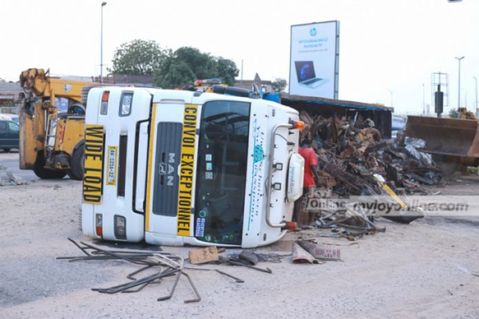 Scrap_truck_accident13-636x424 (Copy) The truck as it lay on its side in the middle of the road