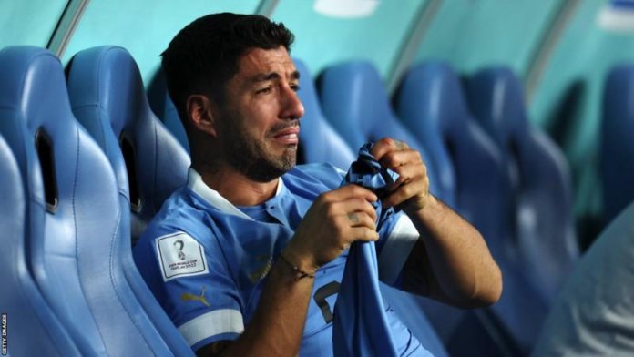 Luis Suarez, still seen as a villain by Ghana fans for his role in their exit from the 2010 finals, was in tears on the Uruguay bench after the South Americans were eliminated in Qatar