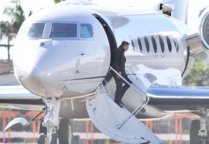 Musk is seen deplaning from his private jet in Los Angeles this past February. Diggzy/Jesal/Shutterstock Musk is seen deplaning from his private jet in Los Angeles this past February. Diggzy/Jesal/Shutterstock
