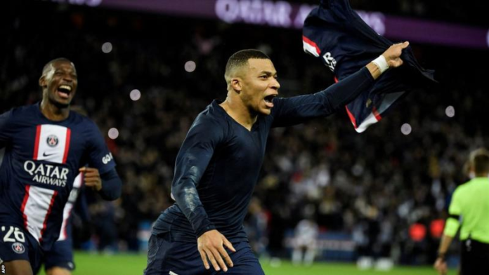 Kylian Mbappe secured the three points with a 94th-minute penalty/ AFP