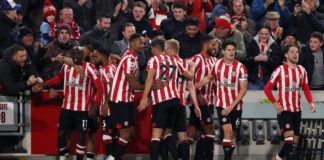Yoane Wissa of Brentford celebrates with teammates after scoring the team's second goal during the Premier League match between Brentford FC and Liverpool FC at Brentford Community Stadium on January 02, 2023 in Brentford, England Image credit: Getty Images