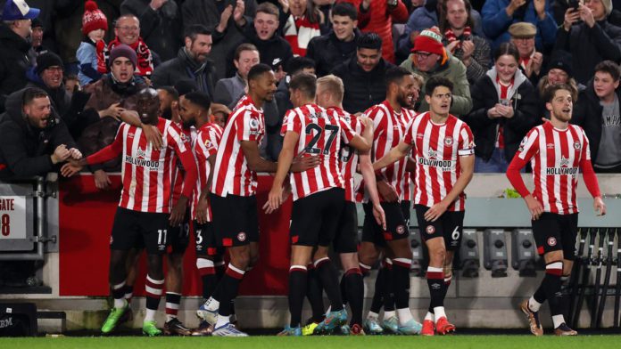 Yoane Wissa of Brentford celebrates with teammates after scoring the team's second goal during the Premier League match between Brentford FC and Liverpool FC at Brentford Community Stadium on January 02, 2023 in Brentford, England Image credit: Getty Images Yoane Wissa of Brentford celebrates with teammates after scoring the team's second goal during the Premier League match between Brentford FC and Liverpool FC at Brentford Community Stadium on January 02, 2023 in Brentford, England Image credit: Getty Images