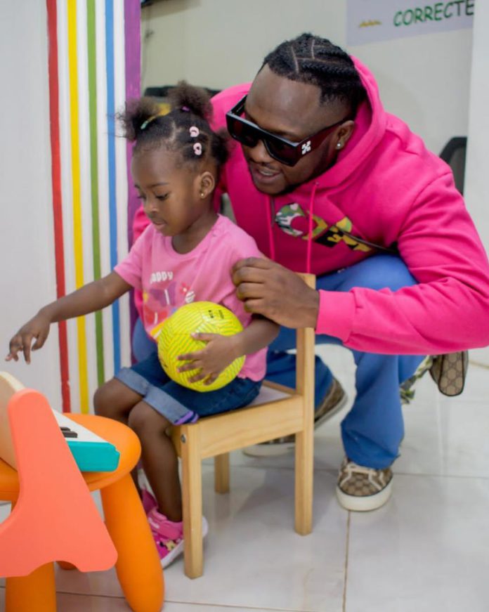 Medikal escorts daughter, Island, to school