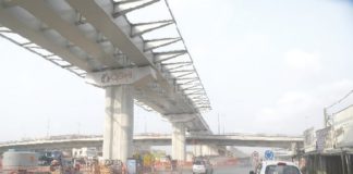 • The second flyover currently under construction at the Obetsebi Lamptey Interchange source: Daily Graphic