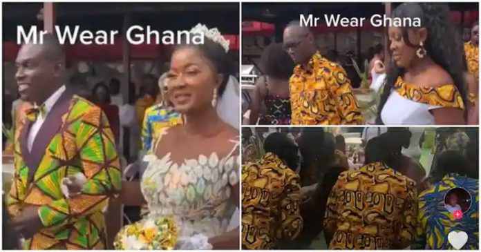 Ghanaian couple slays in African print outfits for their white wedding. source: @ghanafashionhub Ghanaian couple slays in African print outfits for their white wedding. source: @ghanafashionhub