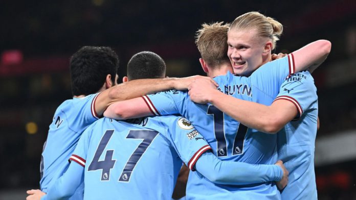 Manchester City's Norwegian striker Erling Haaland (R) celebrates with teammates after scoring his team third goal during the English Premier League football match between Arsenal and Manchester City at the Emirates Stadium in London on February 15, 2023 Image credit: Getty Images Manchester City's Norwegian striker Erling Haaland (R) celebrates with teammates after scoring his team third goal during the English Premier League football match between Arsenal and Manchester City at the Emirates Stadium in London on February 15, 2023 Image credit: Getty Images