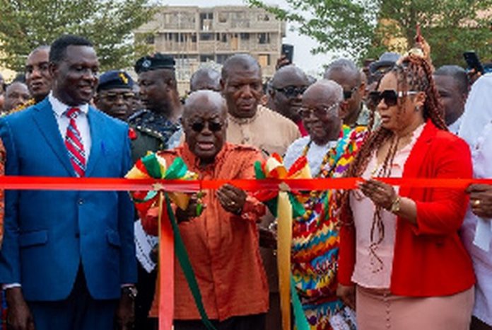 Akuf-Addo flanked by Adwoa Safo and Education Minister as he cuts tape for model school Akuf-Addo flanked by Adwoa Safo and Education Minister as he cuts tape for model school