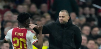 Kudus Mohammed [L] and John Heitinga [R]