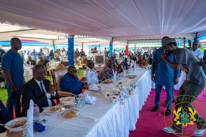 Akufo-Addo applauding Black Sherif