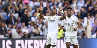Vinicius Junior of Real Madrid CF celebrates after scoring his team's first goal during the LaLiga Santander match between Real Madrid CF and RCD Espanyol at Estadio Santiago Bernabeu on March 11, 2023 in Madrid, Spain. Image credit: Getty Images