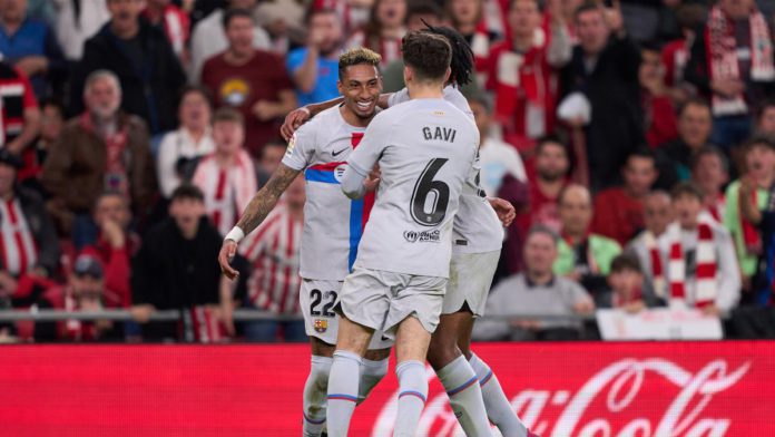 Raphinha of FC Barcelona celebrates with teammates after scoring the team's first goal during the LaLiga Santander match between Athletic Club and FC Barcelona at San Mames Stadium Image credit: Getty Images Raphinha of FC Barcelona celebrates with teammates after scoring the team's first goal during the LaLiga Santander match between Athletic Club and FC Barcelona at San Mames Stadium Image credit: Getty Images