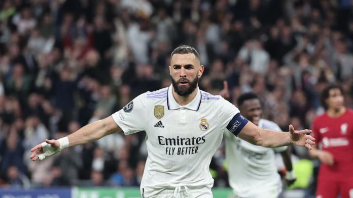 Real Madrid's French forward Karim Benzema celebrates scoring his team's first goal during the UEFA Champions League last 16 second leg football match between Real Madrid CF and Liverpool FC at the Santiago Bernabeu stadium in Madrid on March 15, 2023. (P Image credit: Getty Images Real Madrid's French forward Karim Benzema celebrates scoring his team's first goal during the UEFA Champions League last 16 second leg football match between Real Madrid CF and Liverpool FC at the Santiago Bernabeu stadium in Madrid on March 15, 2023. (P Image credit: Getty Images