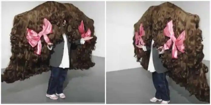 Photos of the widest wig. Credit: @guinnessworldrecords Photos of the widest wig. Credit: @guinnessworldrecords