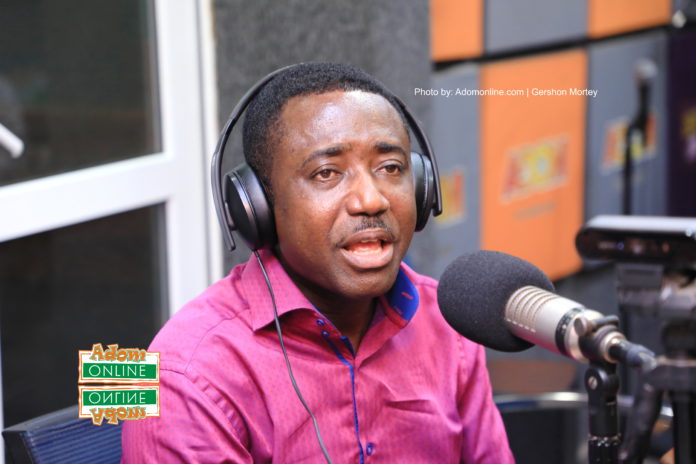Moses OK, gospel minister, song writer and an author