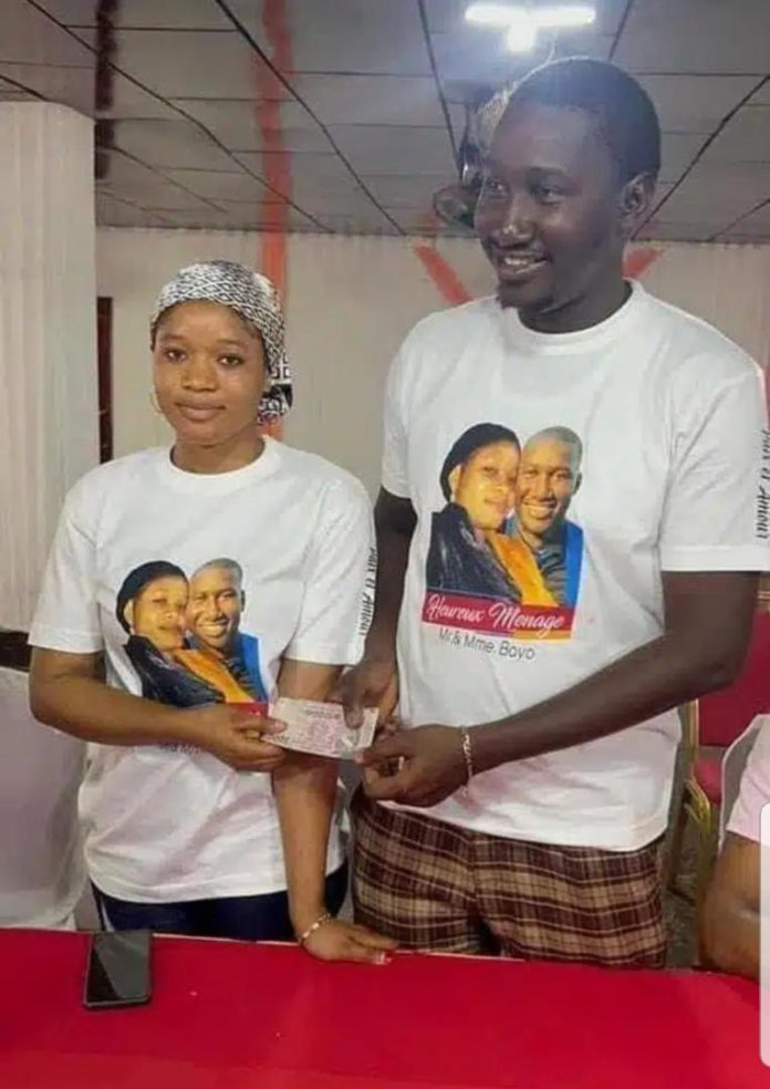Couple stir reactions as they hold simple church wedding