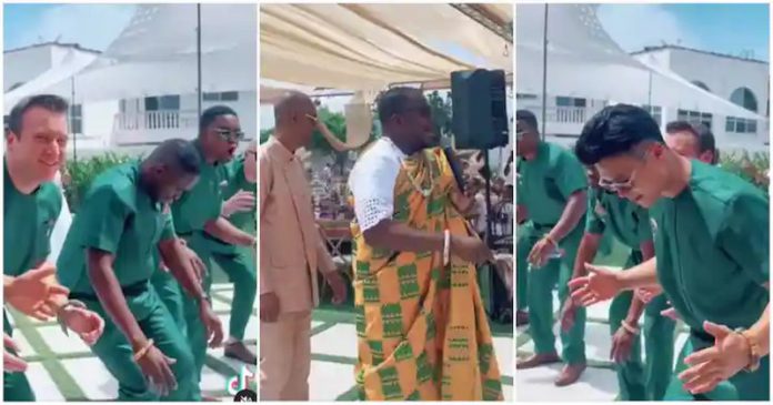 White friends of a Ghanaian groom struggled to dance agbadza in funny trending wedding video Photo source: @giovani.caleb White friends of a Ghanaian groom struggled to dance agbadza in funny trending wedding video Photo source: @giovani.caleb
