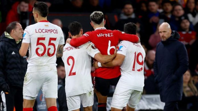Lisandro Martinez was helped off the pitch by Sevilla's Gonzalo Montiel and Marcos Acuna who are his Argentina team-mates Lisandro Martinez was helped off the pitch by Sevilla's Gonzalo Montiel and Marcos Acuna who are his Argentina team-mates