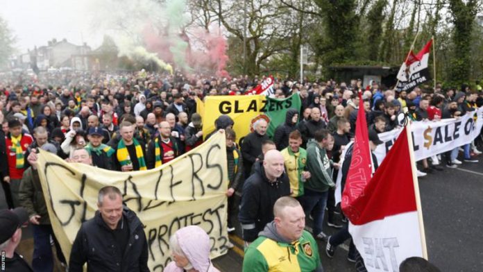 Manchester United fans marched from the city centre to the club's Old Trafford stadium Manchester United fans marched from the city centre to the club's Old Trafford stadium
