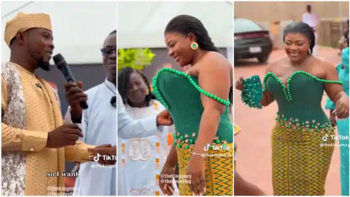 The bride's gown took attention from the groom's speech. Photo source: @thekingemzy The bride's gown took attention from the groom's speech. Photo source: @thekingemzy