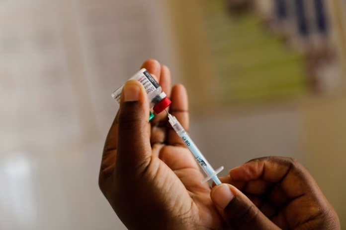 A nurse fills a syringe with malaria vaccine before administering it to an infant at the Lumumba Sub-County hospital in Kisumu, Kenya, July 1, 2022. REUTERS/Baz Ratner A nurse fills a syringe with malaria vaccine before administering it to an infant at the Lumumba Sub-County hospital in Kisumu, Kenya, July 1, 2022. REUTERS/Baz Ratner