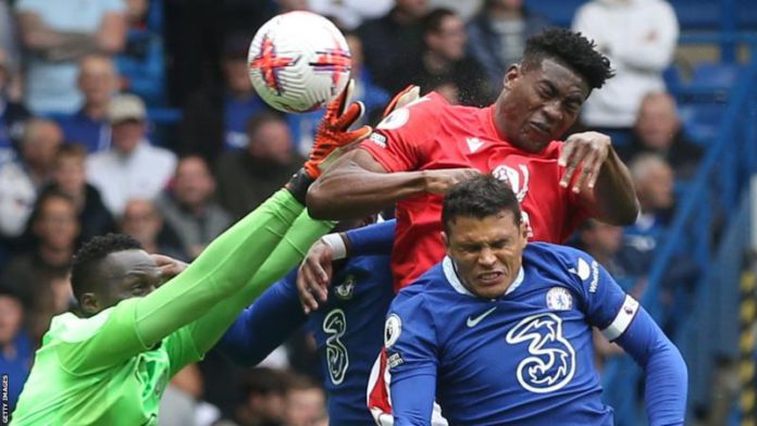Taiwo Awoniyi beat the recalled Edouard Mendy to Renan Lodi’s cross for his first-half goal Taiwo Awoniyi beat the recalled Edouard Mendy to Renan Lodi’s cross for his first-half goal