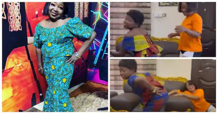 Wayoosi dressed like a woman (L) and his wife lying on the floor laughing (R). Image credit: WAYOOSI TV Wayoosi dressed like a woman (L) and his wife lying on the floor laughing (R). Image credit: WAYOOSI TV