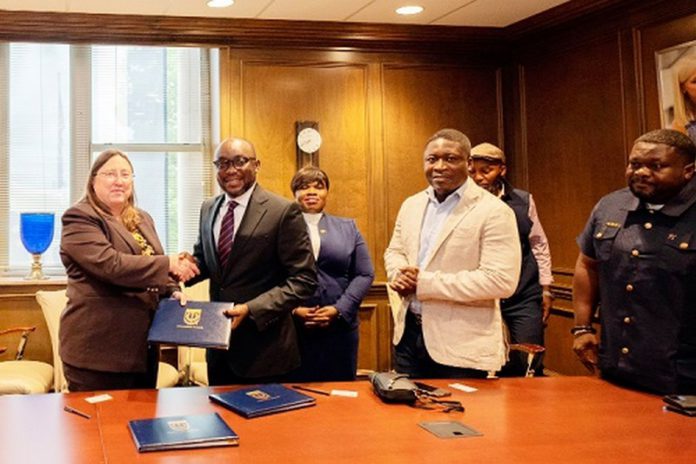 Dr Kingsley Agyemang (2nd from left), the Registrar of the Ghana Scholarship Secretariat, exchanging the signed documents with Dr Abby Parrill-Baker (left), Interim Provost of the University of Memphis. With them is Richard Gyamfi (right), Head of International Relations & Partnerships of Ghana Scholarship Secretariat Dr Kingsley Agyemang (2nd from left), the Registrar of the Ghana Scholarship Secretariat, exchanging the signed documents with Dr Abby Parrill-Baker (left), Interim Provost of the University of Memphis. With them is Richard Gyamfi (right), Head of International Relations & Partnerships of Ghana Scholarship Secretariat