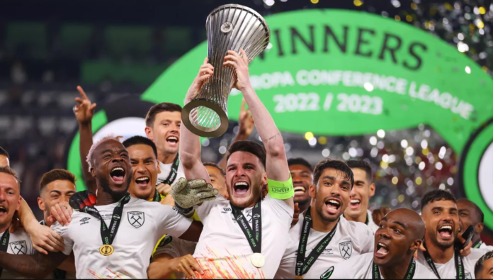 Declan Rice of West Ham United lifts the UEFA Europa Conference League trophy after the team's victory during the UEFA Europa Conference League 2022/23 final match between ACF Fiorentina and West Ham United FC at Eden Arena. Image credit: Getty Images Declan Rice of West Ham United lifts the UEFA Europa Conference League trophy after the team's victory during the UEFA Europa Conference League 2022/23 final match between ACF Fiorentina and West Ham United FC at Eden Arena. Image credit: Getty Images