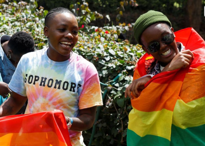 Participants react with Pride rainbow flags as they attend the Badilika festival to celebrate the LGBT rights in Nairobi, Kenya, June 11, 2023. REUTERS/Monicah Mwangi Participants react with Pride rainbow flags as they attend the Badilika festival to celebrate the LGBT rights in Nairobi, Kenya, June 11, 2023. REUTERS/Monicah Mwangi
