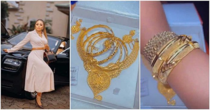 Ace Nollywood actress Regina Daniels stirs emotions online as she flaunts her expensive gold set worth over 10m. Photo credit: @regina.daniels Ace Nollywood actress Regina Daniels stirs emotions online as she flaunts her expensive gold set worth over 10m. Photo credit: @regina.daniels