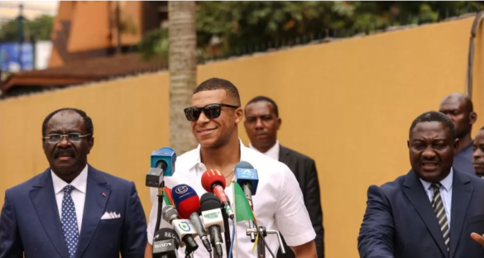 AFP Image caption: Kylian Mbappé was born in Paris to a Cameroonian father AFP Image caption: Kylian Mbappé was born in Paris to a Cameroonian father