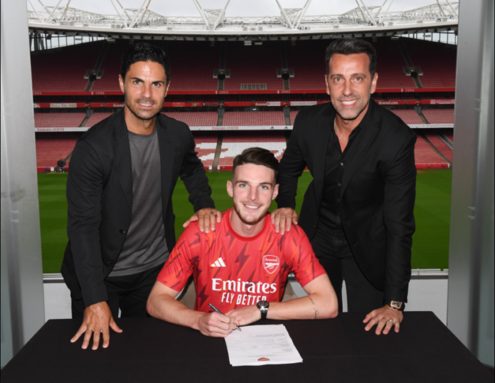 Rice (centre) has become Arsenal's record transfer following his move from West Ham Rice (centre) has become Arsenal's record transfer following his move from West Ham
