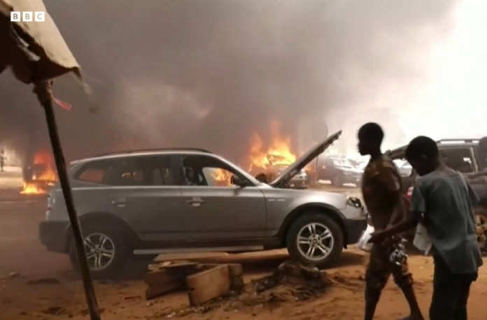 Ousted president's party HQ set ablaze in Niger | credit: BBC Ousted president's party HQ set ablaze in Niger | credit: BBC