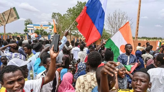 A-large-crowd-calling-for-France-to-leave-Niger-gathered-near-the-capital-on-Friday (Copy)