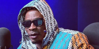Shatta Wale looking into the camera in a studio | photo credit: @ghkwaku/Instagram