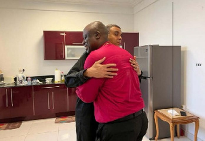 Bishop Dag with the late Bishop Oko as they shared a warm hug