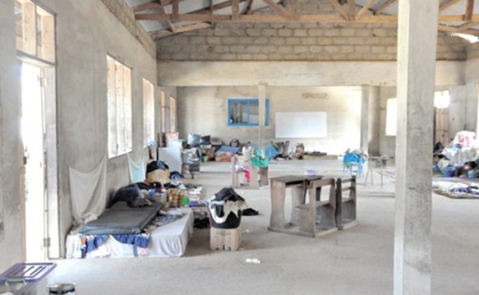 Belongings of flood victims in a classroom at St Kizito Senior High Technical School (1)