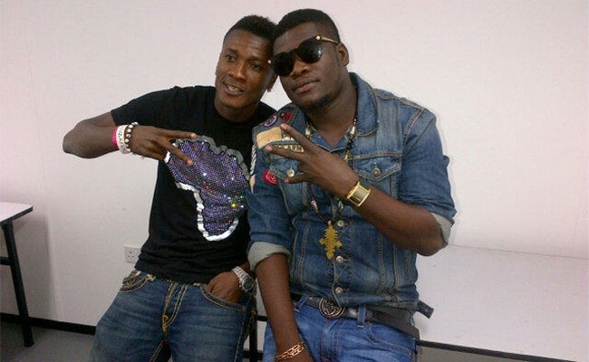 asamoah-gyan-and-castro