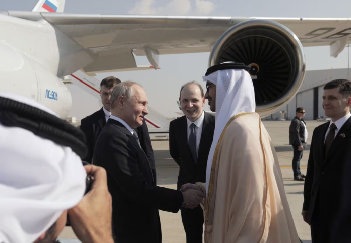 Russian President Vladimir Putin is welcomed by Minister of Foreign Affairs of the United Arab Emirates Sheikh Abdullah bin Zayed bin Sultan Al Nahyan upon arrival at the Abu Dhabi International Airport, United Arab Emirates December 6, 2023. Sputnik/Andrey Gordeev/Pool via REUTERS Acquire Licensing Rights Russian President Vladimir Putin is welcomed by Minister of Foreign Affairs of the United Arab Emirates Sheikh Abdullah bin Zayed bin Sultan Al Nahyan upon arrival at the Abu Dhabi International Airport, United Arab Emirates December 6, 2023. Sputnik/Andrey Gordeev/Pool via REUTERS Acquire Licensing Rights