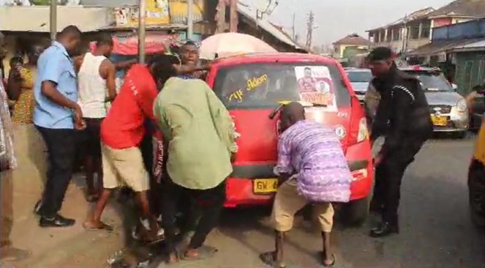Taxi driver runs over traffic police officer at Agona Swedru