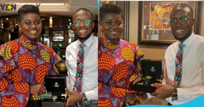 CEO of Warrior King Watches Patrick Amofah gifts Afua Asantewaa Singathon a customised gold watch. Photo credit: @afuaasantewaaaduonum. CEO of Warrior King Watches Patrick Amofah gifts Afua Asantewaa Singathon a customised gold watch. Photo credit: @afuaasantewaaaduonum.