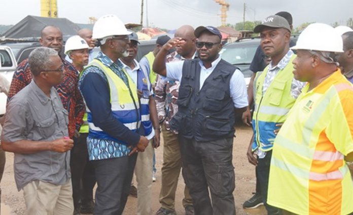 Francis Asenso-Boakye (2nd from left), Minister of Roads and Highways, speaking to Kwabena Bempong (right), Chief Resident Engineer, Ofankor–Nsawam road project. With him are Abass Awolu (left), Chief Director, Ministry of Roads and Highways, and some officials of the ministry. Picture: ELVIS NII NOI DOWUONA Francis Asenso-Boakye (2nd from left), Minister of Roads and Highways, speaking to Kwabena Bempong (right), Chief Resident Engineer, Ofankor–Nsawam road project. With him are Abass Awolu (left), Chief Director, Ministry of Roads and Highways, and some officials of the ministry. Picture: ELVIS NII NOI DOWUONA