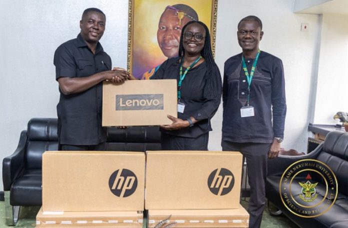 Dr Gideon Boako, spokesperson for the Vice- President (left) presenting one of the laptops to Prof Rita Akosua Dickson, Vice-Chancellor of the KNUST (second from right). With them is the Registrar of the school Dr Gideon Boako, spokesperson for the Vice- President (left) presenting one of the laptops to Prof Rita Akosua Dickson, Vice-Chancellor of the KNUST (second from right). With them is the Registrar of the school